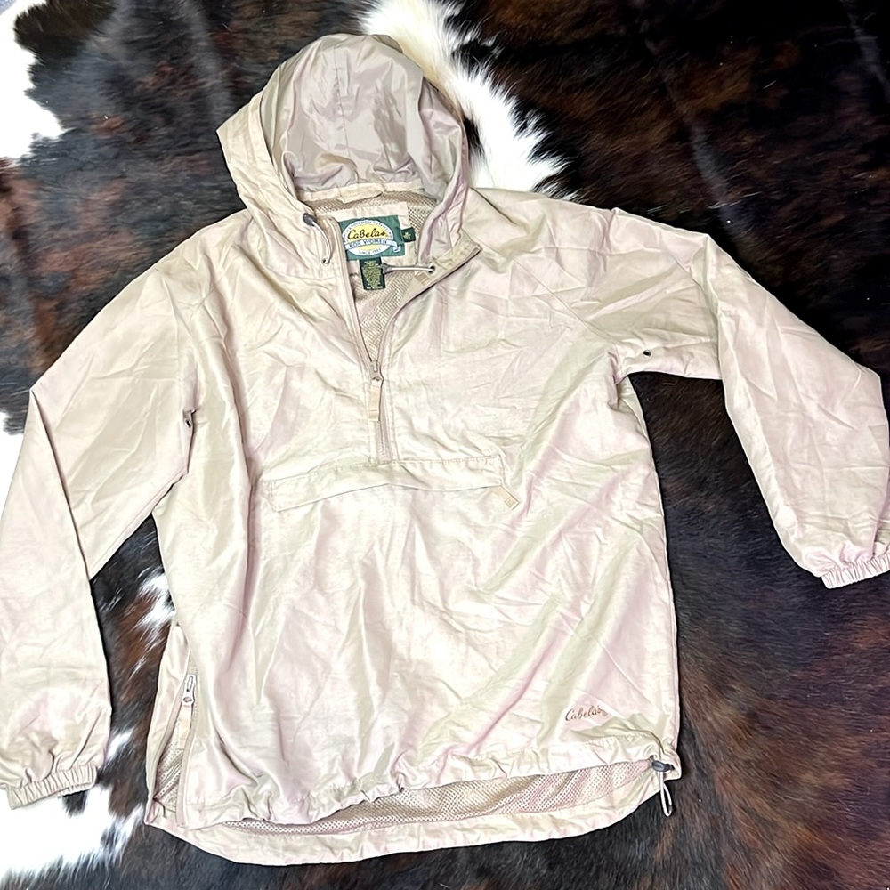 Cabelas for women pullover hooded rain jacket, size medium.
